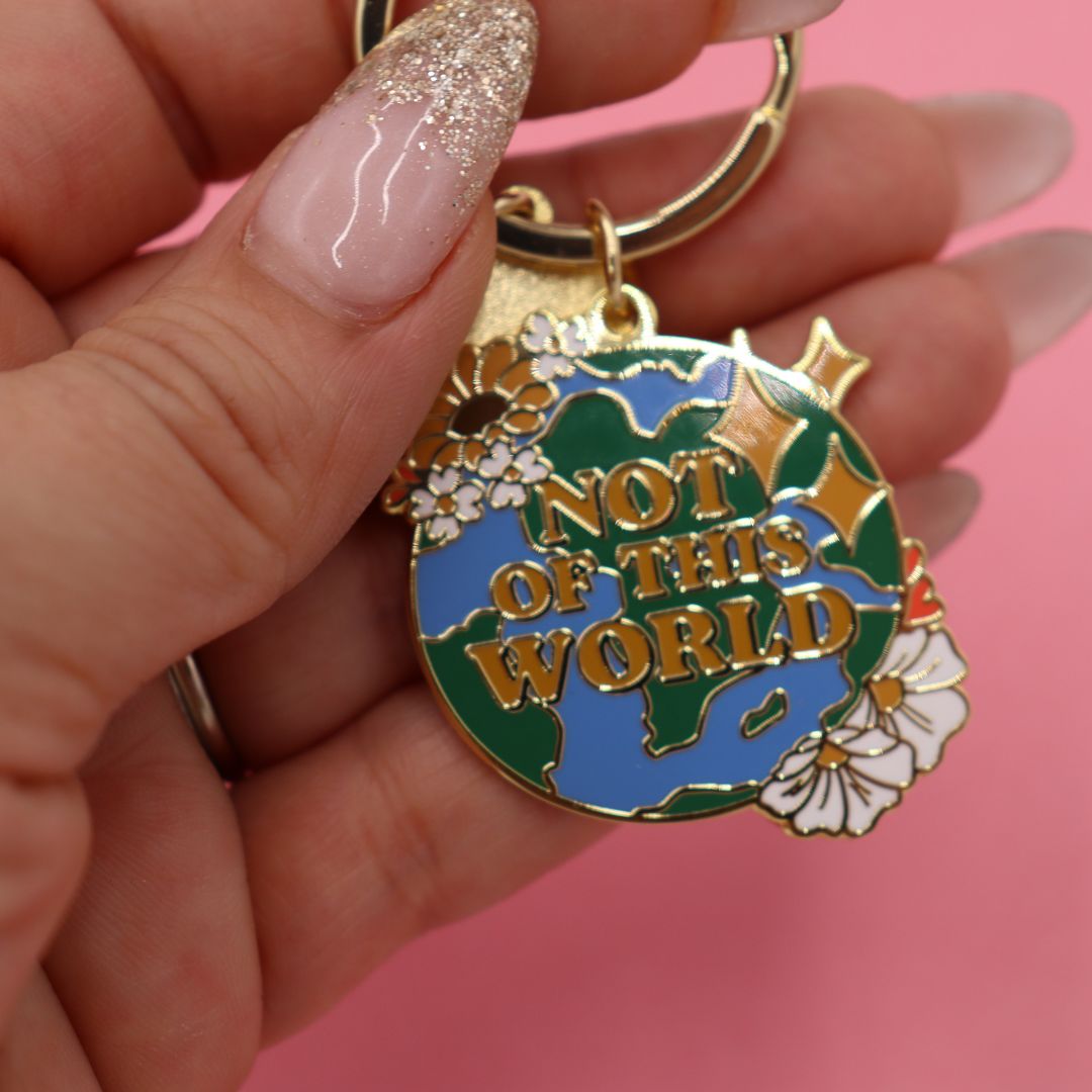 NOT OF THIS WORLD ENAMEL KEYCHAIN - Little & Brave